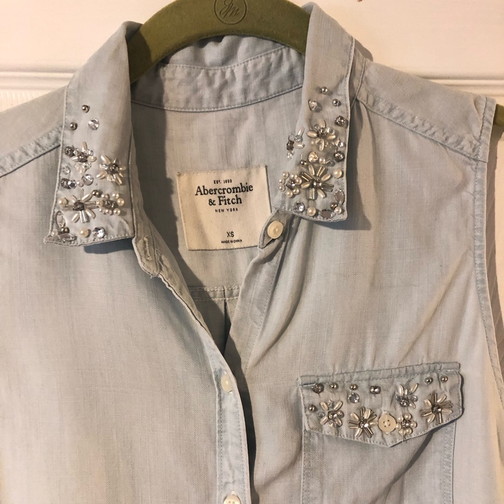 Sleeveless denim button down